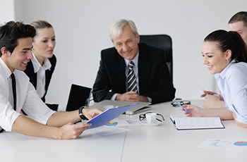 Business people at conference table image
